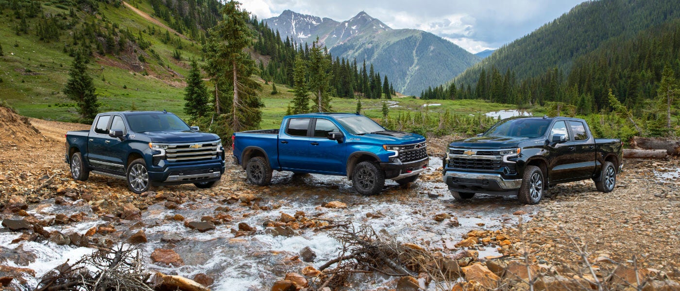2026 Chevy Silverado 1500 lineup parked in mountains