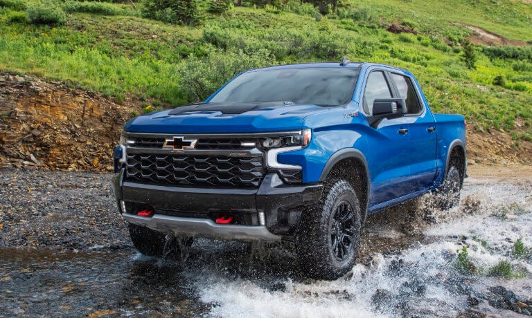 2026 Chevy Silverado 1500 offroading in a stream